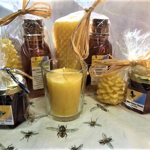 Assorted honey products with beeswax candles