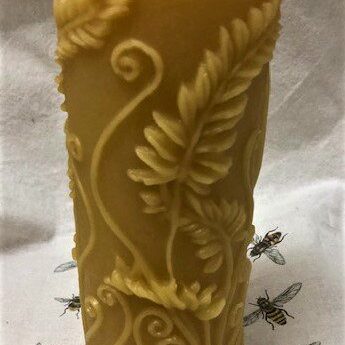 Beeswax candle with intricate designs